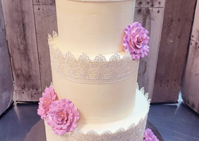 three-tier-wedding-cake-design-with-pink-edible-flowers-temecula-bakery